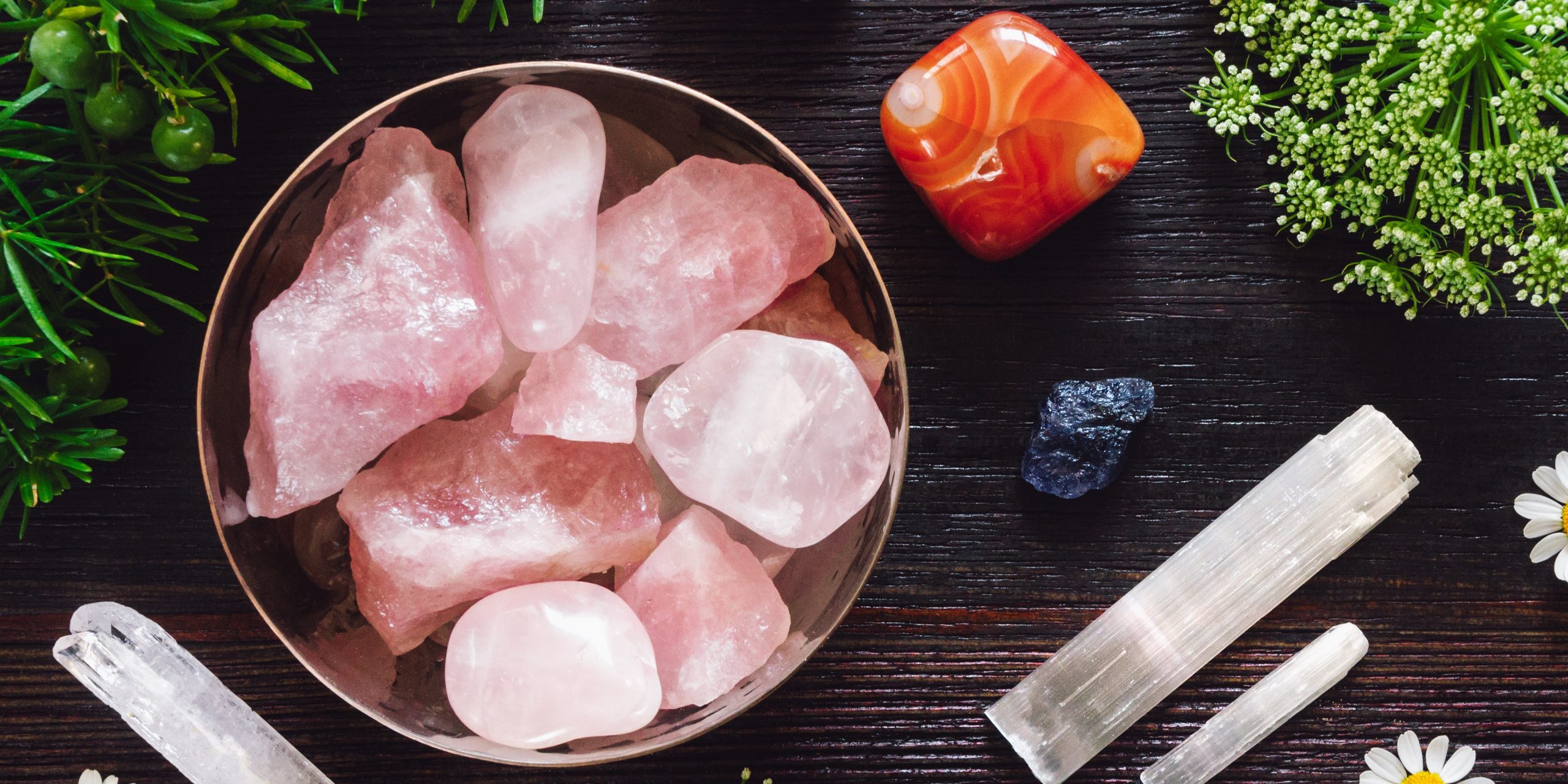 Crystals offer amazing support. Rose quartz especially is good for working with self love and self worth. This image shows rough pieces as well as other stones such as selenite